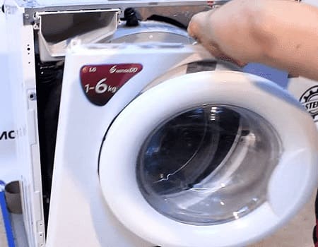 Removing the front panel of the washing machine