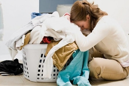 overloading the laundry in the washing machine